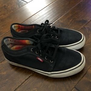 Black Vans skate shoes